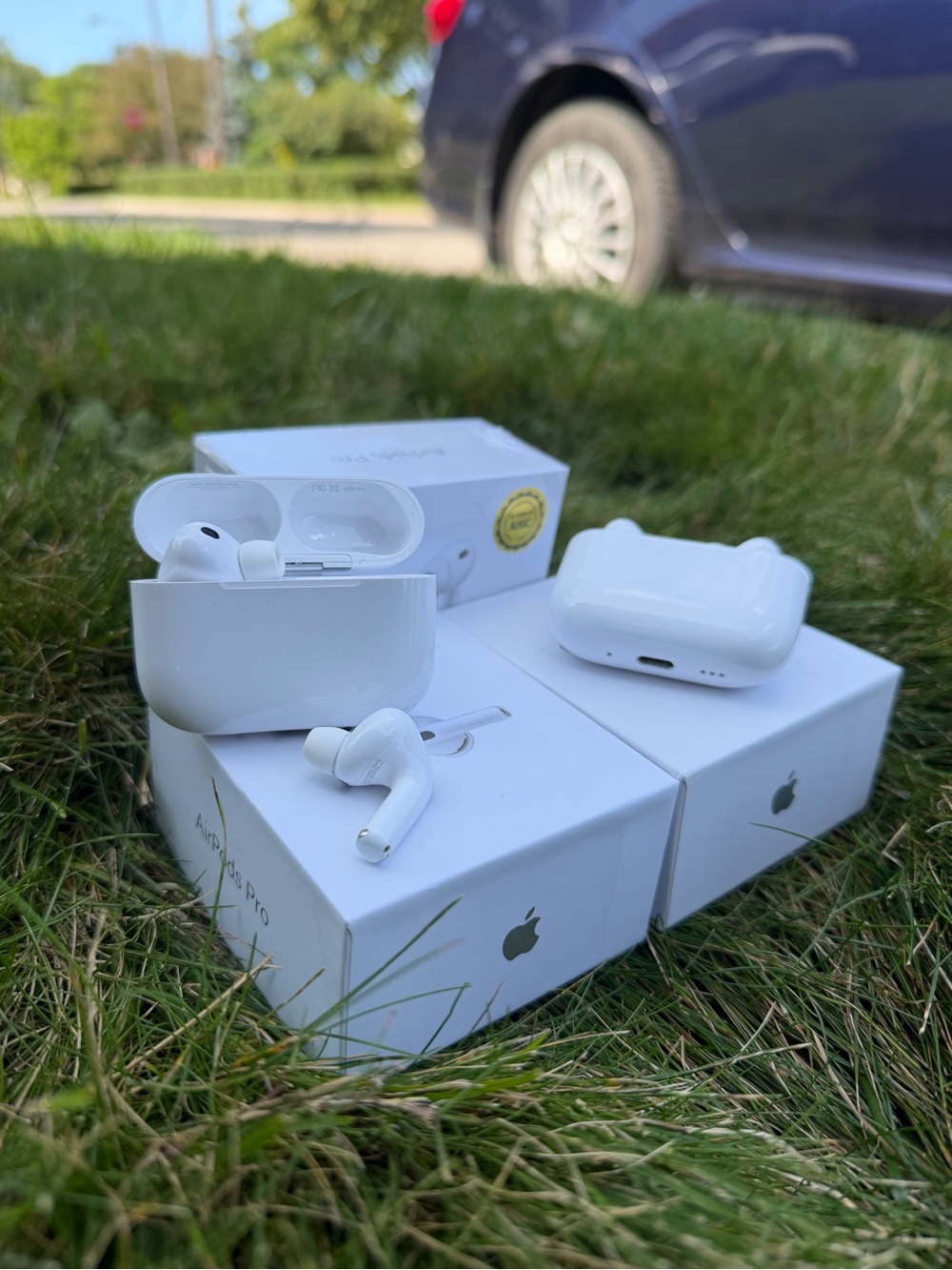 White Wireless Earbuds with Charging Case - Apple
